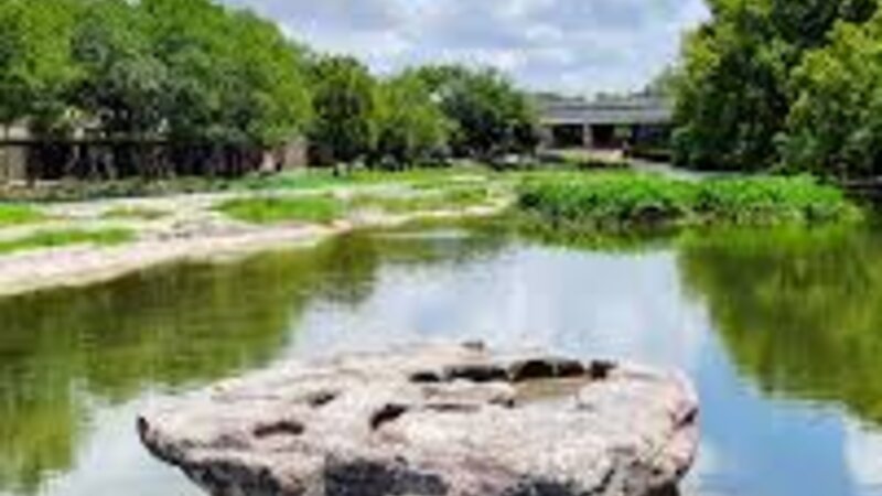 The famous round rock in Brushy Creek that gave Round Rock, Texas its name